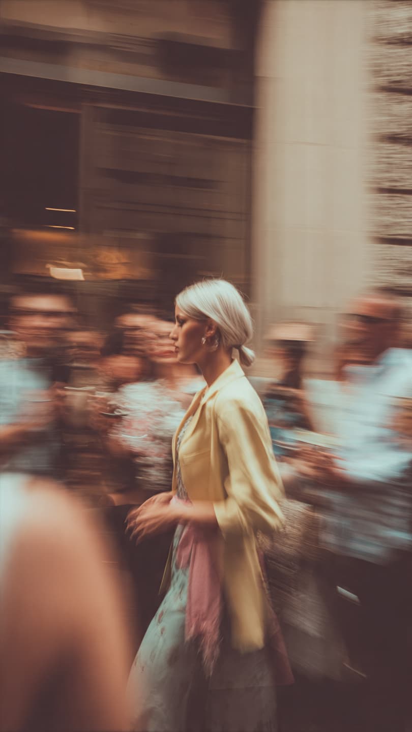 A panning photo of a female model mid walk - Output 2